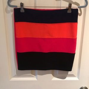 Rue 21 multi colored skirt size M. Black, orange, pink.  Gently used condition.